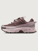 Nike Zoom Vomero Roam in Tattoo and Particle Rose, lateral side view.