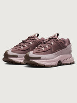 Nike Zoom Vomero Roam in Tattoo and Particle Rose, paired shoes front view.