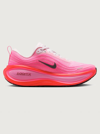 Pink running shoe with black Nike logo on a white background