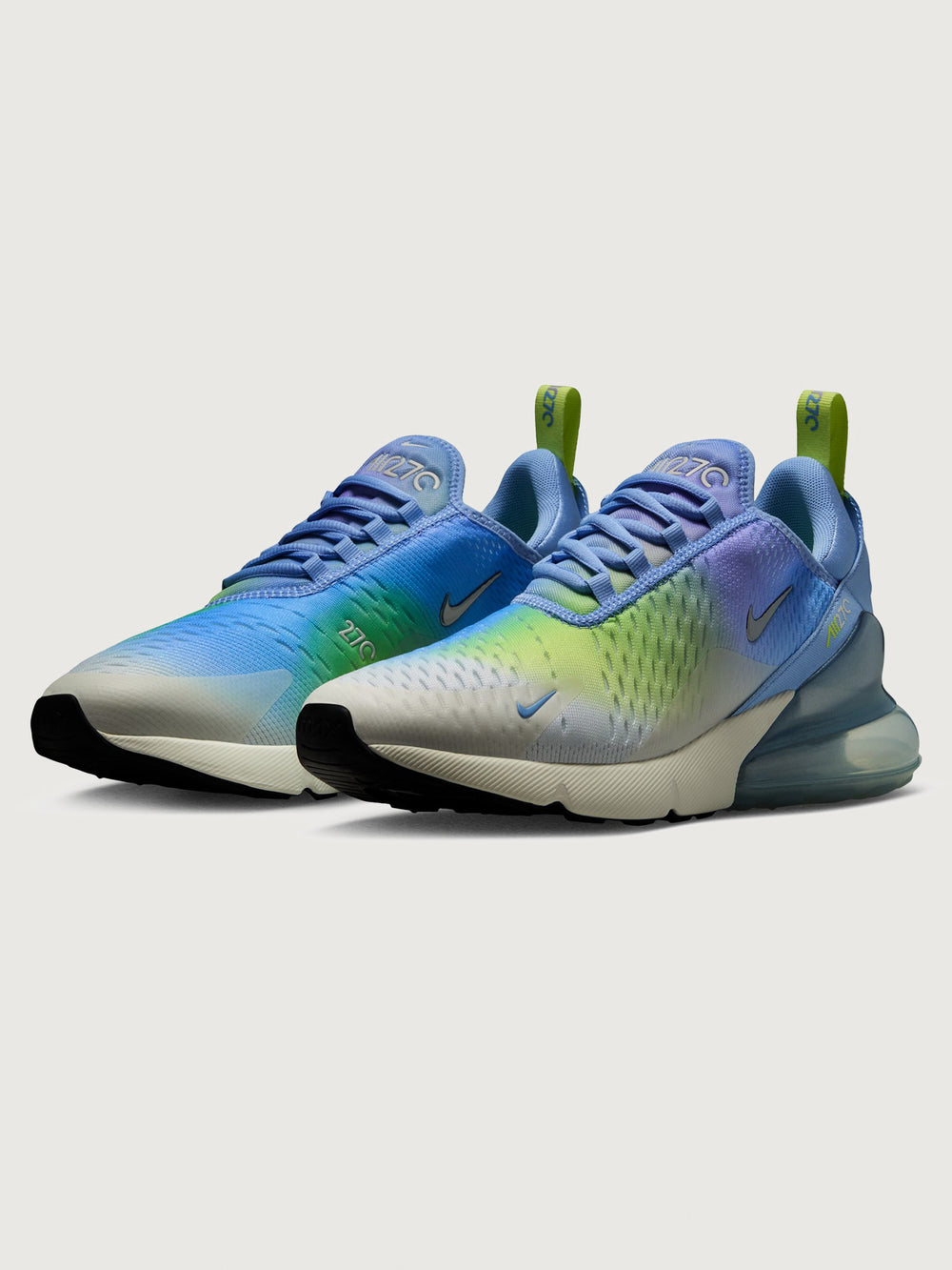 Multicolored sneaker with gradient design on a white background