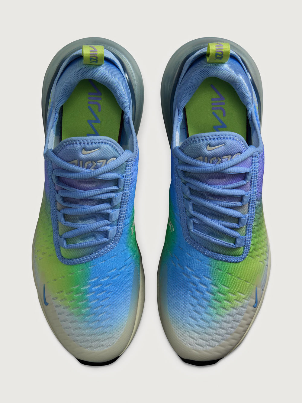 Multicolored sneaker with gradient design on a white background