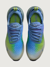 Multicolored sneaker with gradient design on a white background