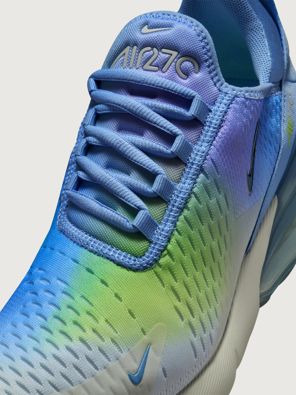 Multicolored sneaker with gradient design on a white background
