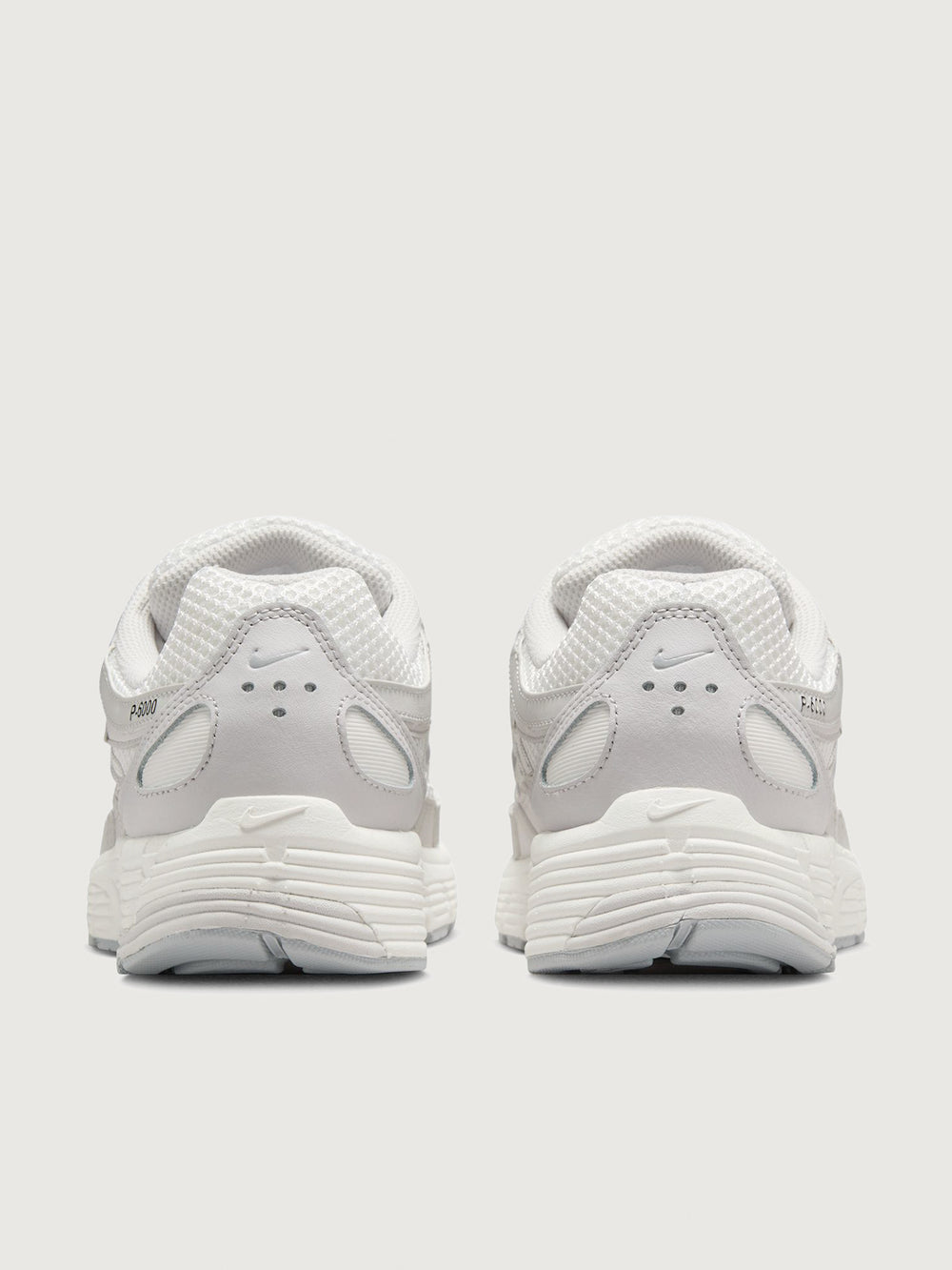 Nike P-6000 SE in Summit White and Wolf Grey, back heel view.