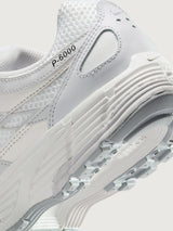 Nike P-6000 SE in Summit White and Wolf Grey, close-up heel and outsole detail.
