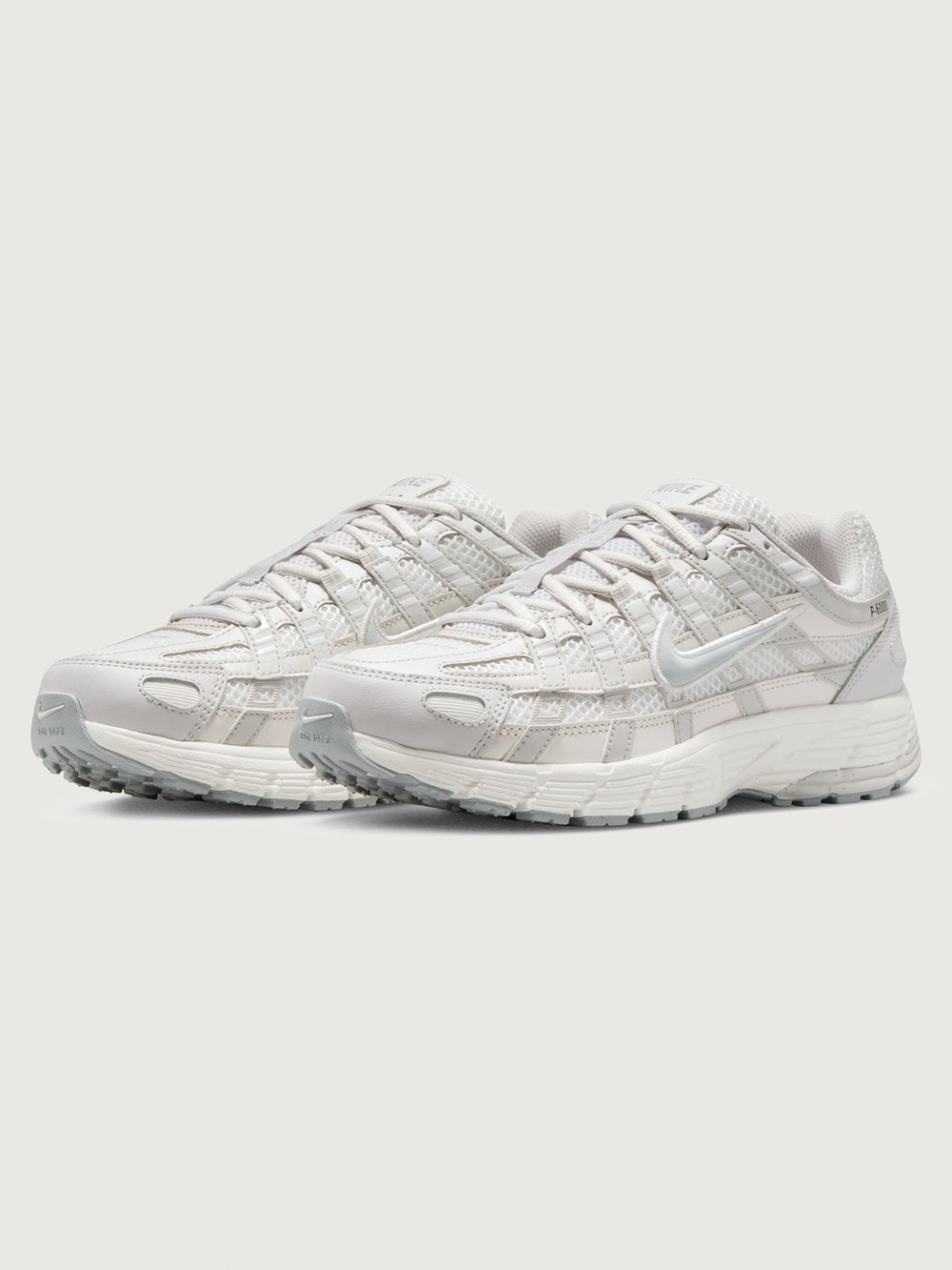 Nike P-6000 SE in Summit White and Wolf Grey, angled front pair view.