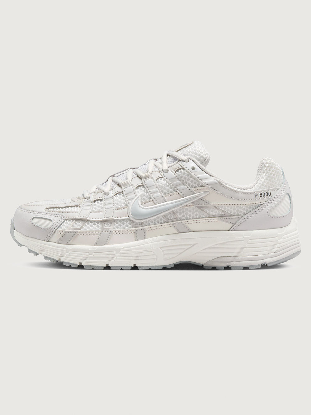 Nike P-6000 SE in Summit White and Wolf Grey, medial side profile view.