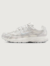 Nike P-6000 SE in Summit White and Wolf Grey, medial side profile view.
