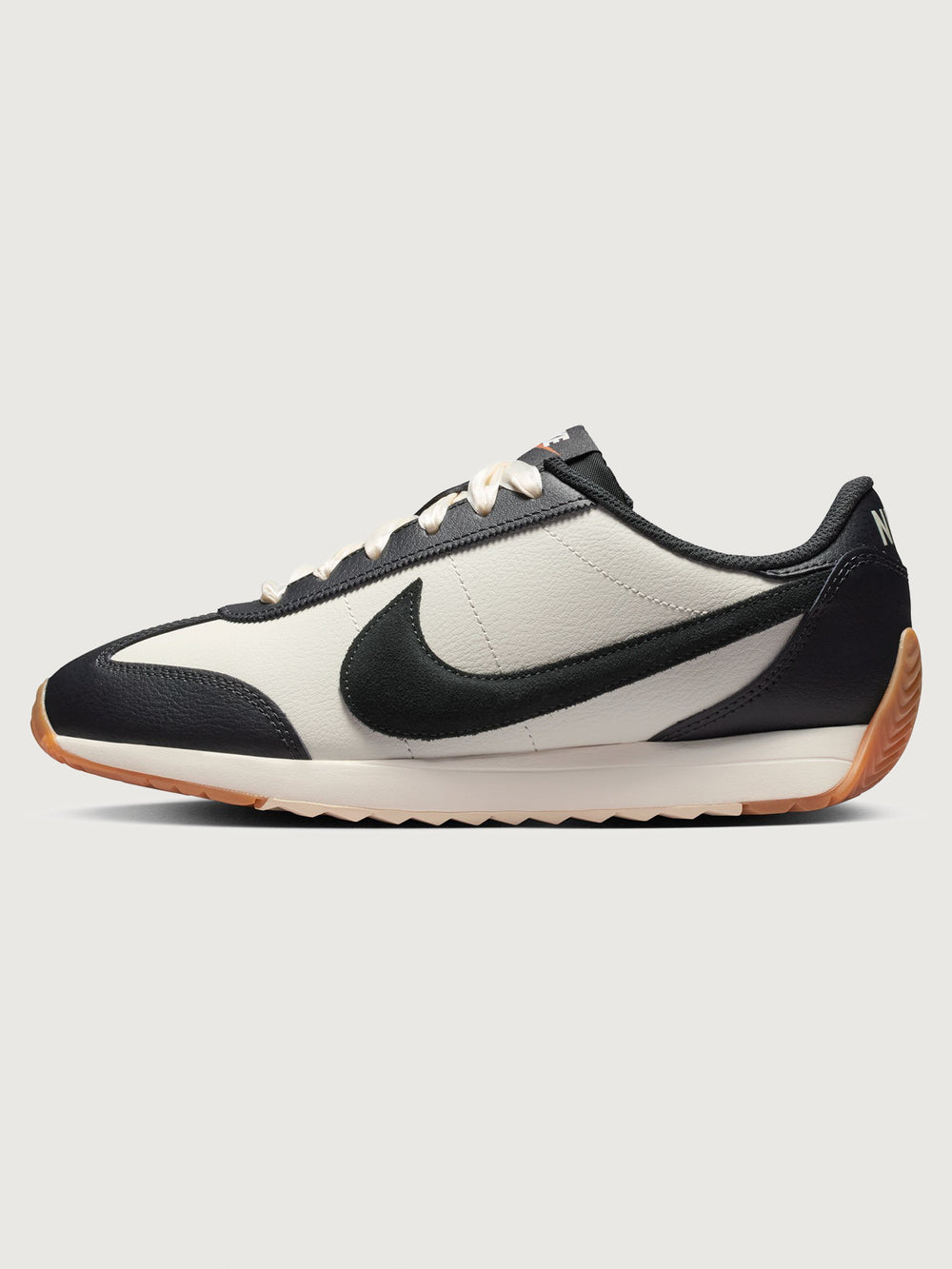Women’s Pacific Leather trainer in Sail and Off Noir, side view.