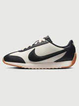 Women’s Pacific Leather trainer in Sail and Off Noir, side view.