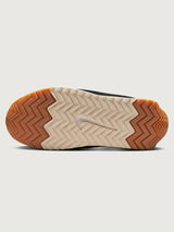 Women’s Pacific Leather trainer in Sail and Off Noir, outsole traction detail.