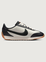 Women’s Pacific Leather trainer in Sail and Off Noir, side view.