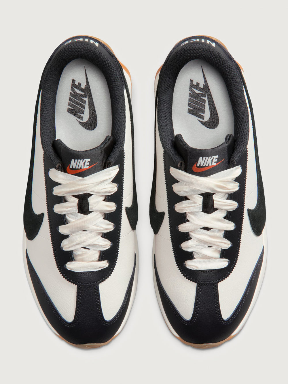 Women’s Pacific Leather trainers in Sail and Off Noir, top view of pair.