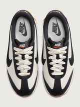 Women’s Pacific Leather trainers in Sail and Off Noir, top view of pair.