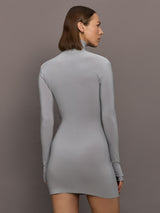 Model is wearing Long Sleeve Turtleneck Mini Dress in Grey, back view highlighting seamless finish and slim profile.