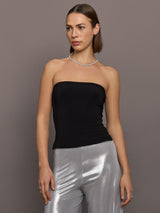 Model is wearing Strapless Contour Top in Black, front view highlighting slim fit and straight neckline.