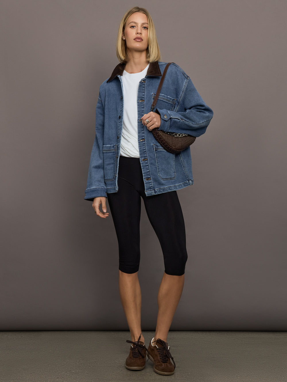Model is wearing Pedal Pusher in Black, full body styled look.