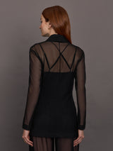 Model wears black single-breasted mesh jacket with a collared neck and tailored fit.
