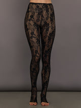 Black floral lace tights on a gray background