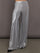 Model is wearing Bias Wide-Leg Pant in Silver, front view.