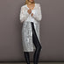 Model styled in Hooded Robe to Knee Clear White with sequin sheer overlay and open front.