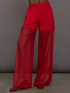 Model wears the Boyfriend Elephant Sweatpants in Tiger Red, featuring a relaxed fit with oversized legs, mesh detailing, and an elastic waistband.