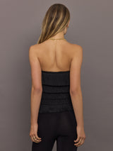 Back view of Strapless All Over Fringe Top Black with straight strapless cut and layered fringe.