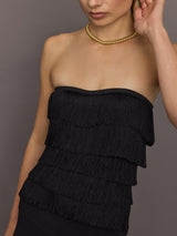 Close-up of Strapless All Over Fringe Top Black layered fringe texture and strapless neckline.