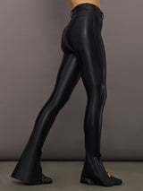 Side view of Spat Jeans Black showing slim fit and flared split hem.