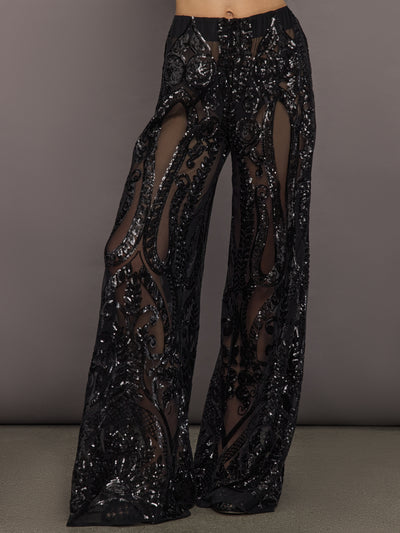 Front view of model wearing Boyfriend Elephant Sweatpant Black with sequin embroidered sheer overlay.