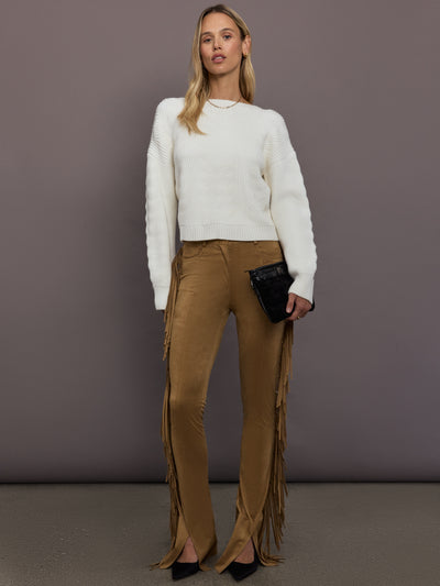 Model is wearing the Fringe Spat Jeans in Camel, full body front view.