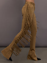 Model is wearing the Fringe Spat Jeans in Camel, side view highlighting fringe detail.