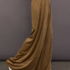 Model is wearing the Pleat Pant in Camel, full body front view.