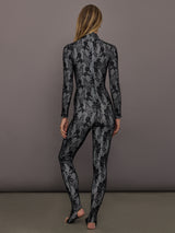 Back view of Long Sleeve Slim Fit Turtle Catsuit with Footie Black White Lace with lace pattern throughout.
