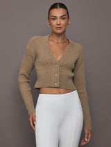 Model wearing Luna Cropped Cardigan in Camel, front view.
