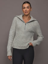 Model wearing Half-Zip Ribbed Knit Sweater in heather grey, front view.