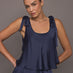 Model wearing Satin Tie Shoulder Tank Top in navy, front view.