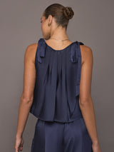 Back view of Satin Tie Shoulder Tank Top in navy with bow ties and pleats.