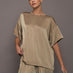 Front view of Elmwood oversized satin tee styled with matching shorts.
