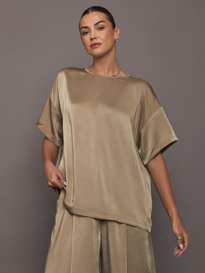 Front view of Elmwood oversized satin tee styled with matching shorts.
