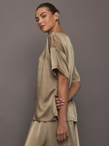 Side view of Elmwood oversized satin tee styled with matching shorts.