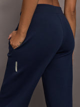 Close-up of On Focus Tech Sweatpants for women in navy highlighting waistband, side pocket, and soft fabric texture.