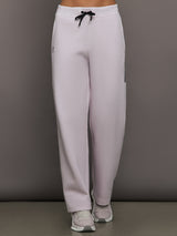 Model wears a pair of light purple sweatpants with black drawstring.