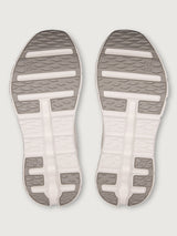Pink running shoe with white sole on a light gray background