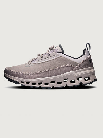 Gray and purple athletic shoe on a white background