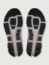 Gray and purple athletic shoe on a white background