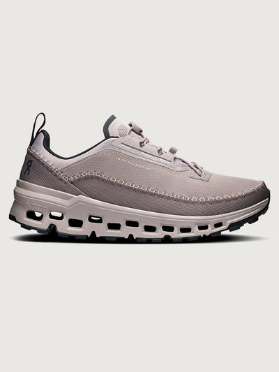 Gray and purple athletic shoe on a white background