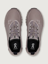 Gray and purple athletic shoe on a white background