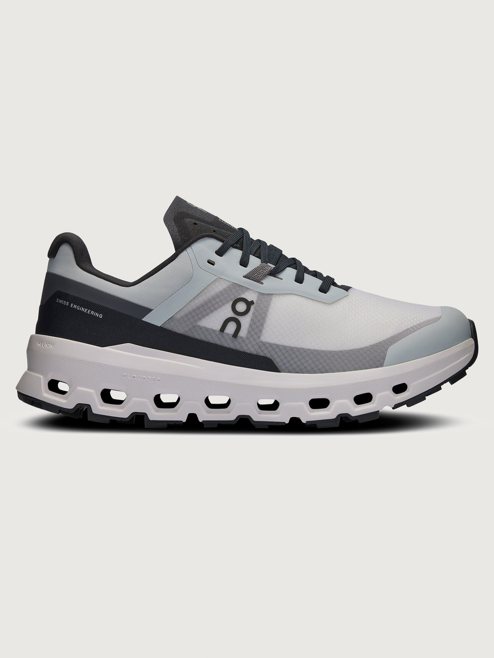 Gray and black running shoe on a light gray background