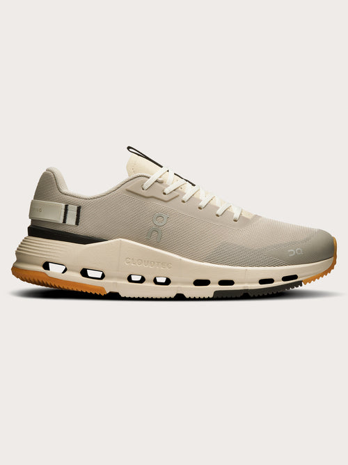 Truffle Dew-colored athletic sneakers.